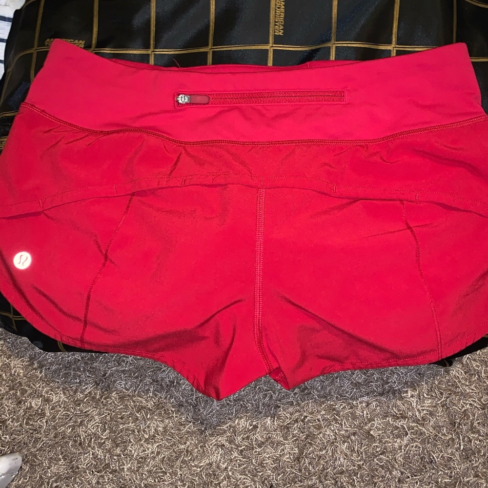 red lululemon shorts